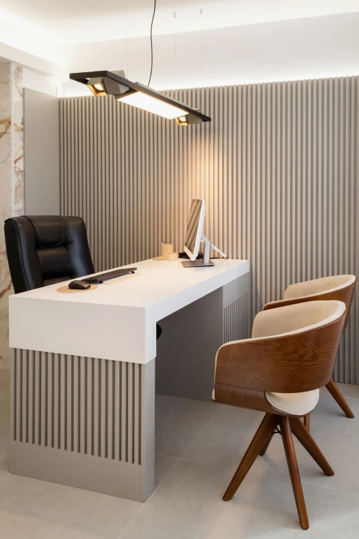 the modern office has leather chairs and a large desk