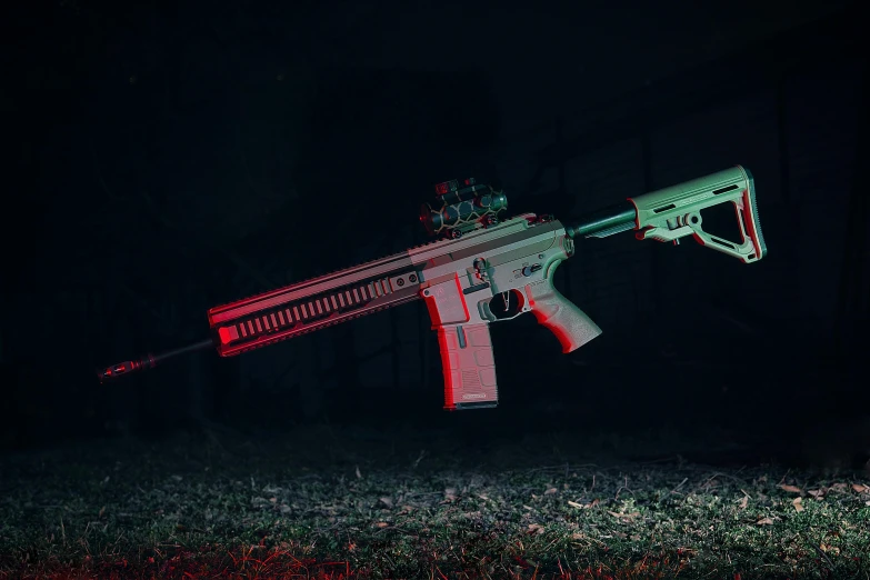 the machine gun illuminated by red lights on it