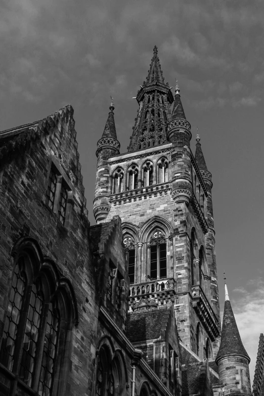 a very tall building with many windows and turrets