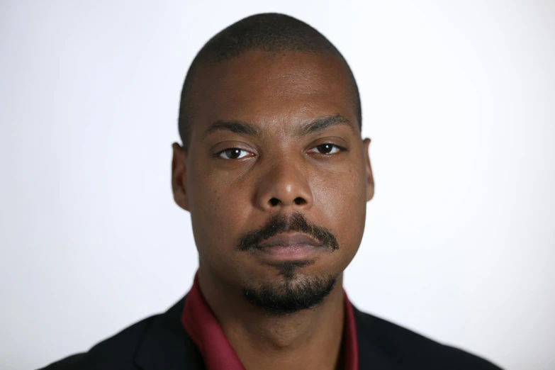 a close up of a person with a collar