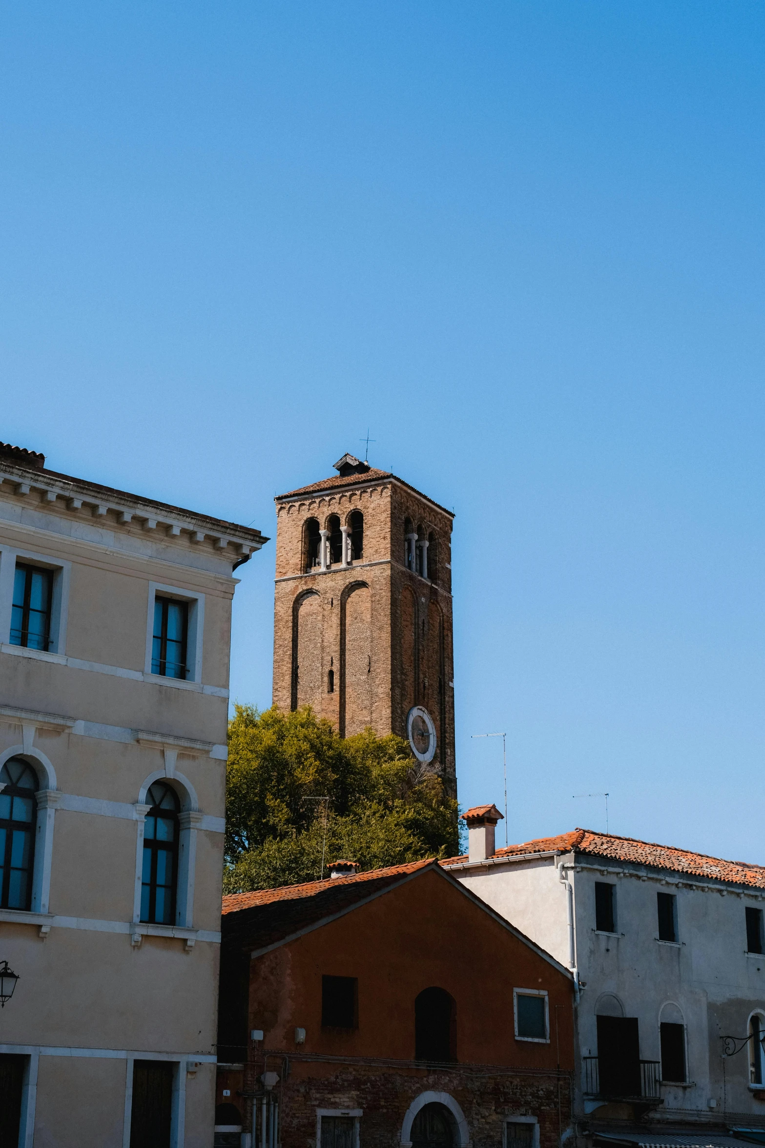 an old town building with the tower visible