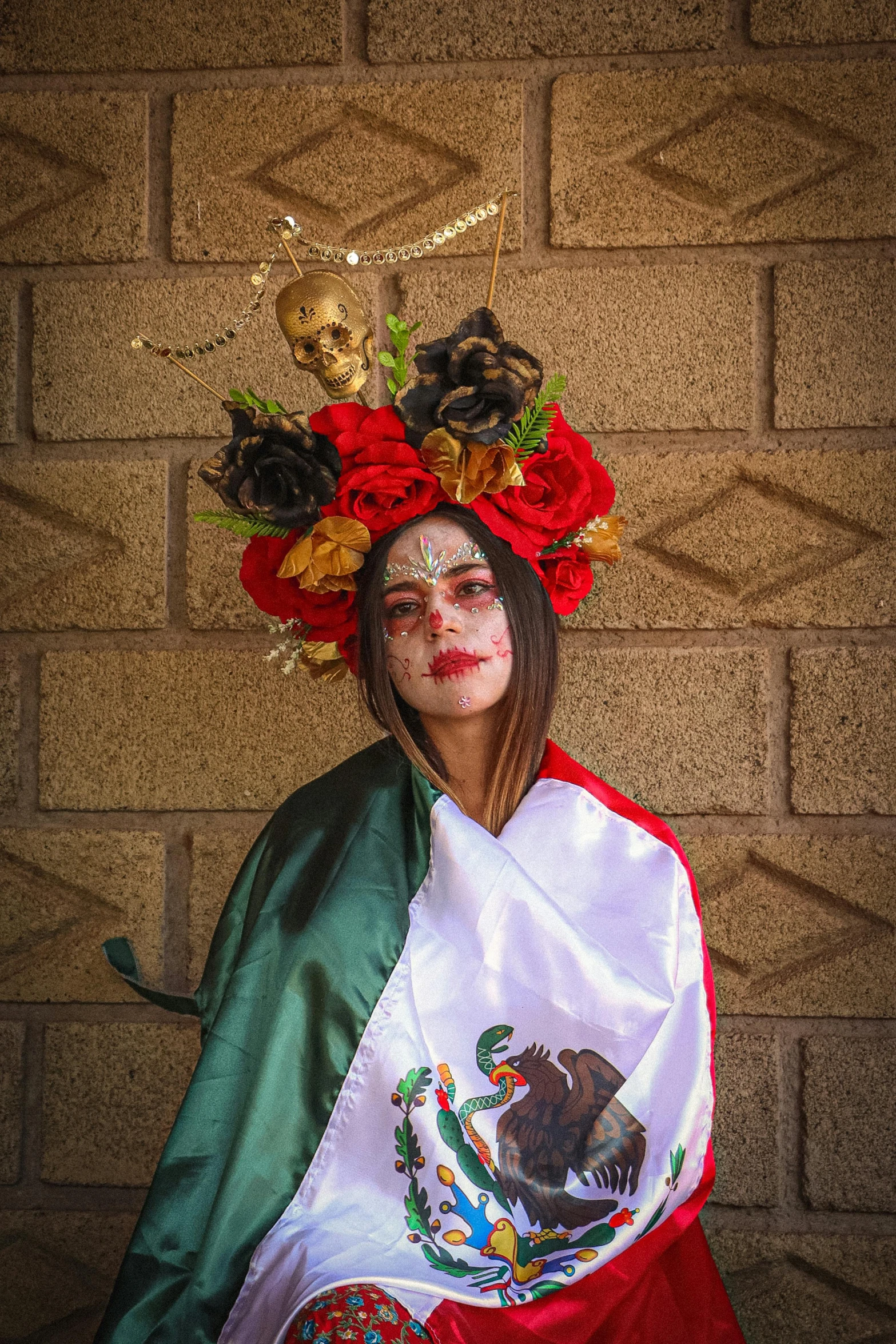 a mexican woman with flowers on her head and a banner