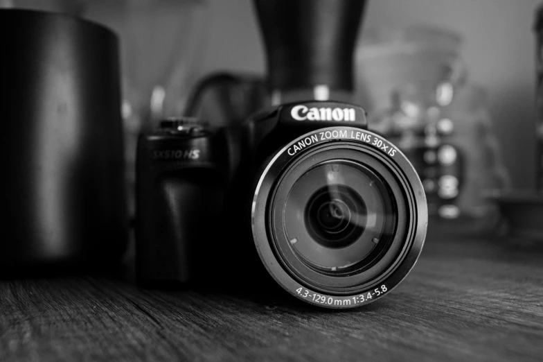 a black and white image of a camera