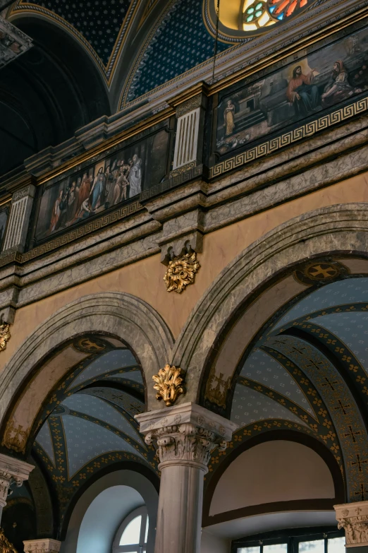 the ornately decorated balcony of a cathedral with gold details