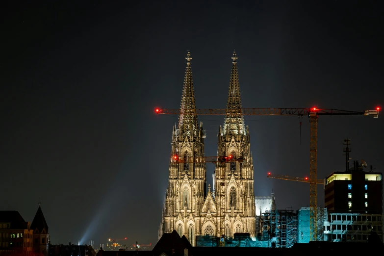 an architectural castle with lit up windows and lights