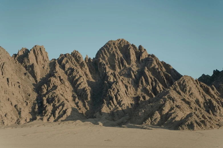 a group of mountains made out of rock and sand