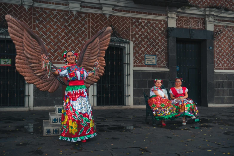 there is a woman that has wings on her head