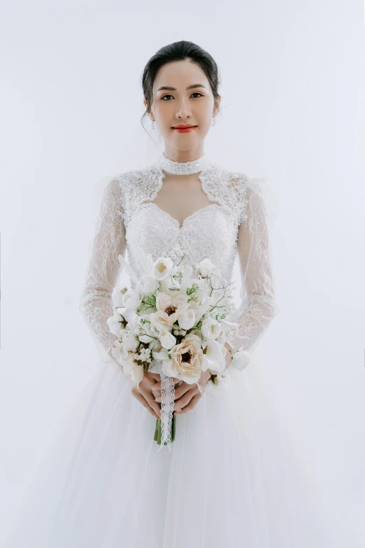 a woman in a wedding dress with bouquet