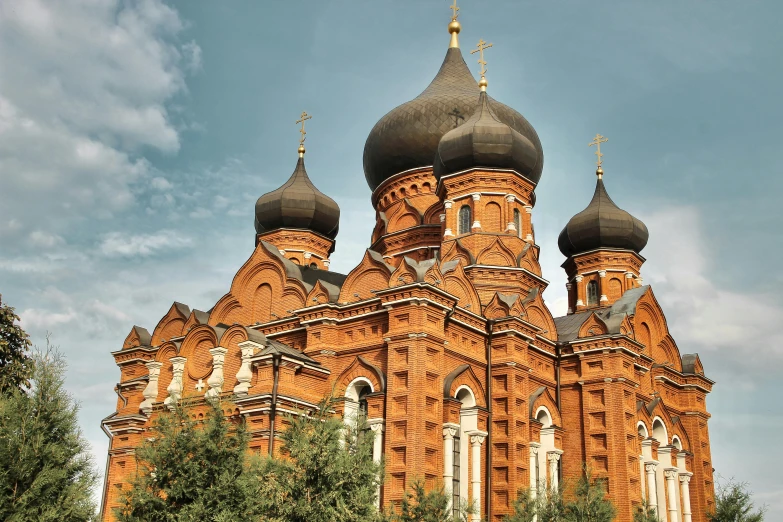 a picture of a building that has some spires on it