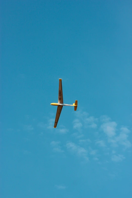 a small airplane is flying in the sky