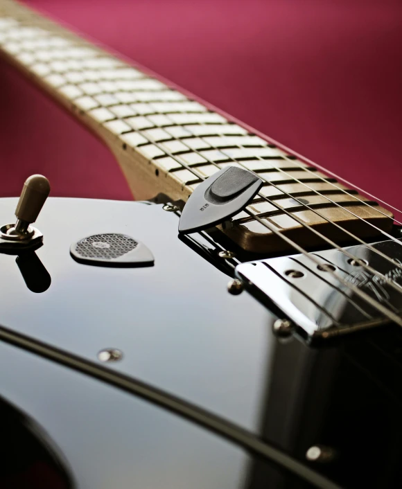 a guitar that has the fretshell on it