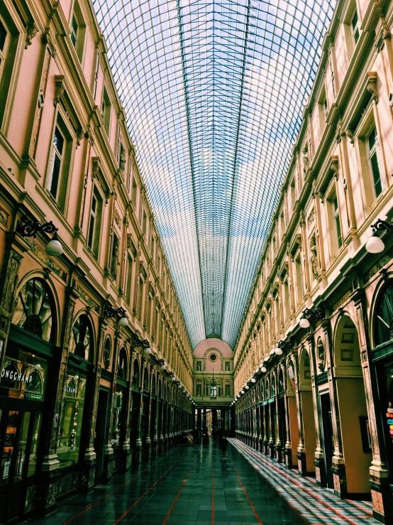 the interior of an older building in a shopping district