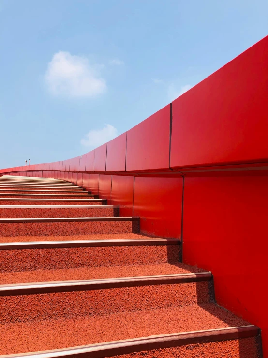 a lot of stairs are lined up against the wall