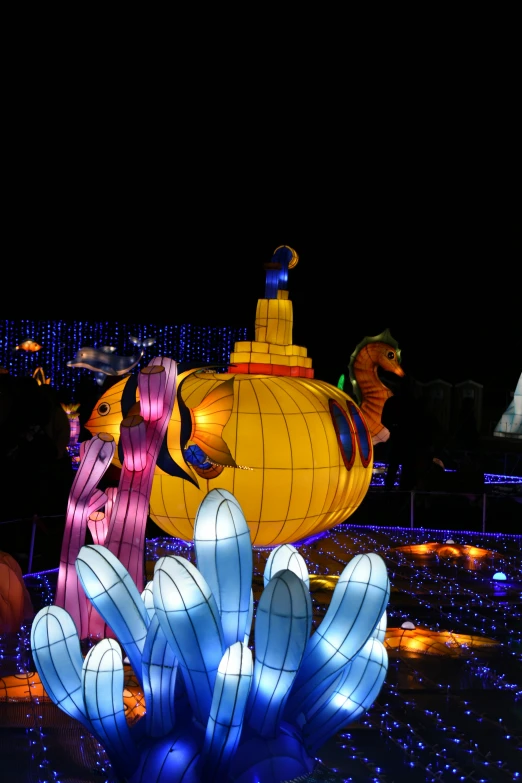 this is an outdoor display with lighted up fake figures