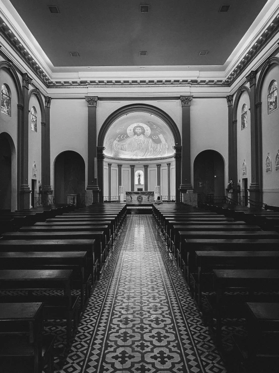 a church that has pews with stained glass windows