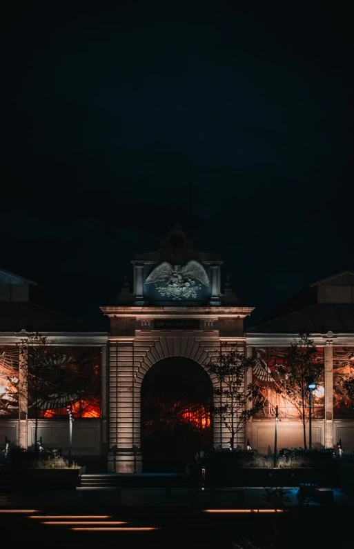 a clock tower in a small building under a night sky