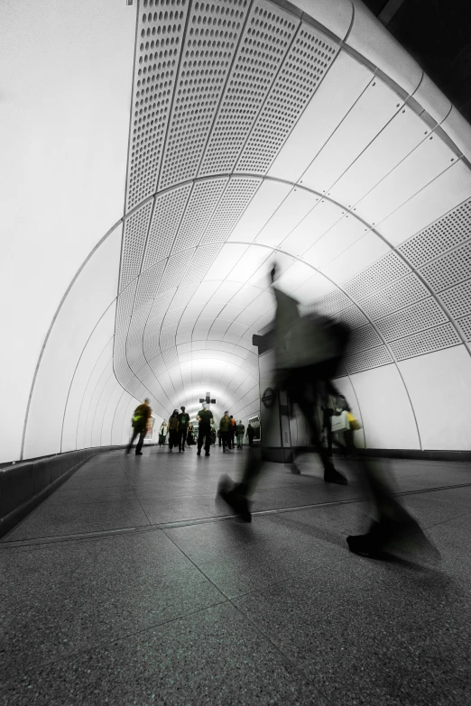 motion blur of people in the tunnel