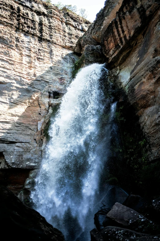 the water is going up into the rocks