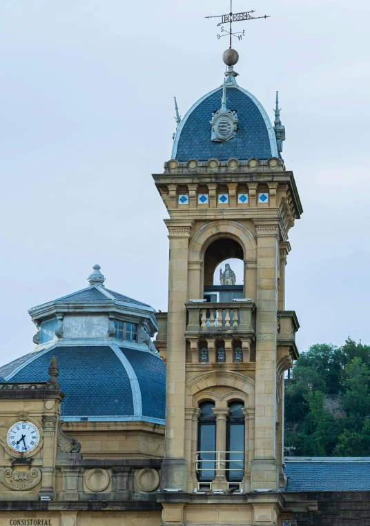 the clock tower is situated on top of the building