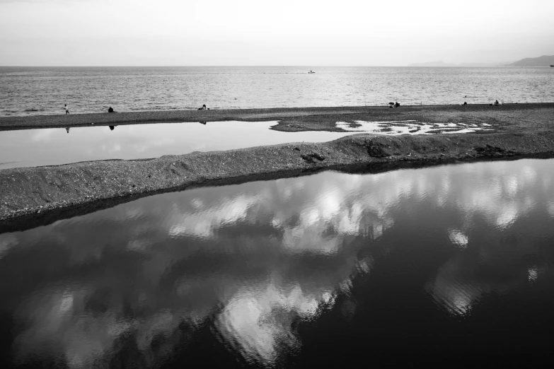 a cloudy and calm day on the water