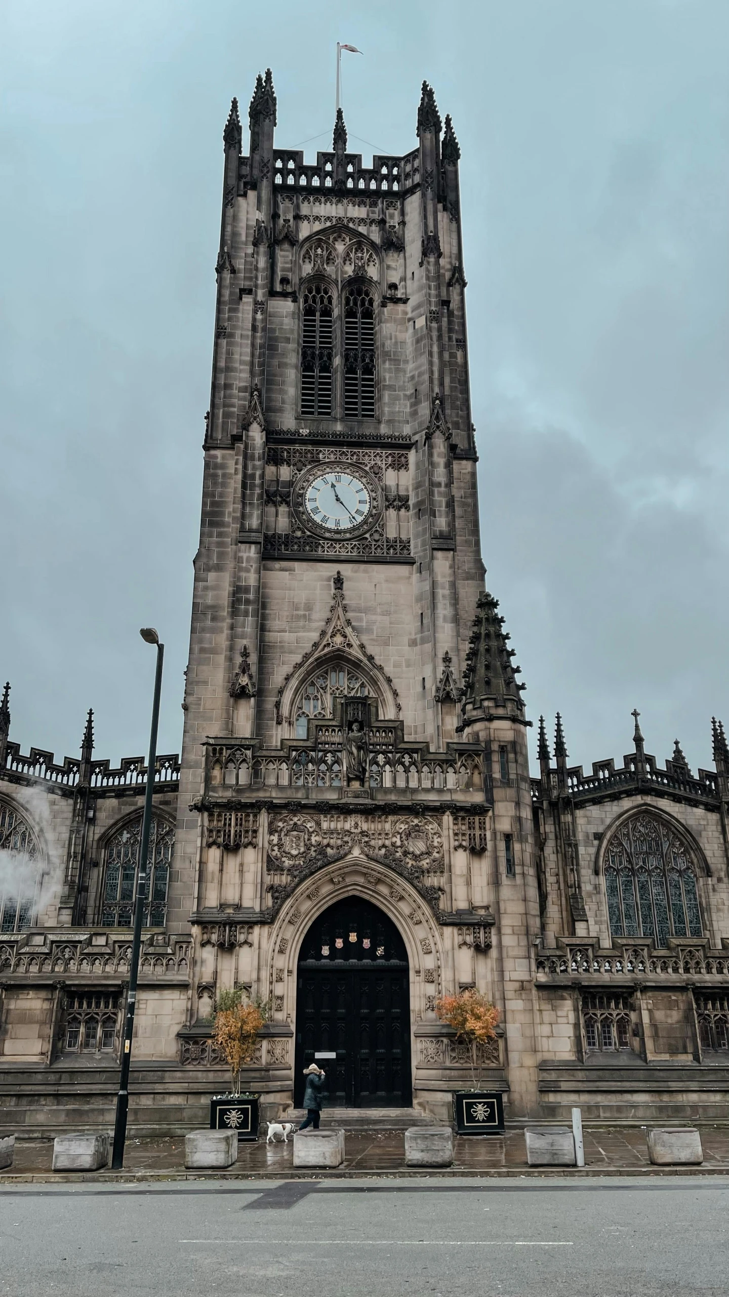 a tall clock tower with a steeple at the top