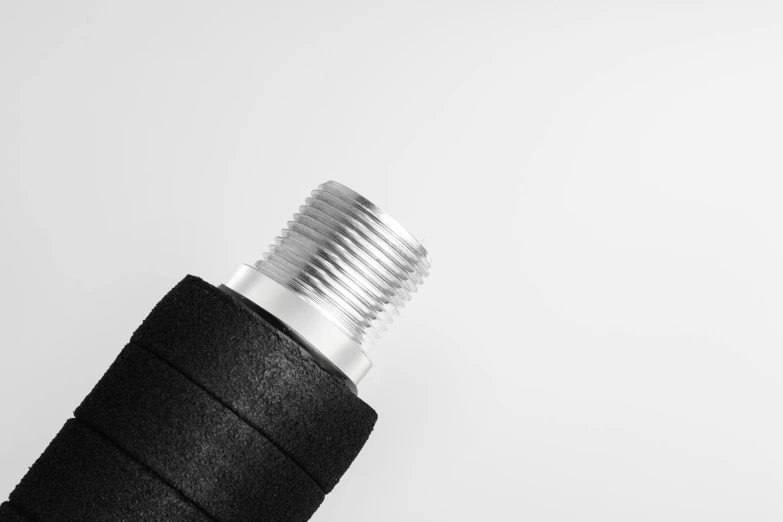 a spooly spooled hose is in front of a white background