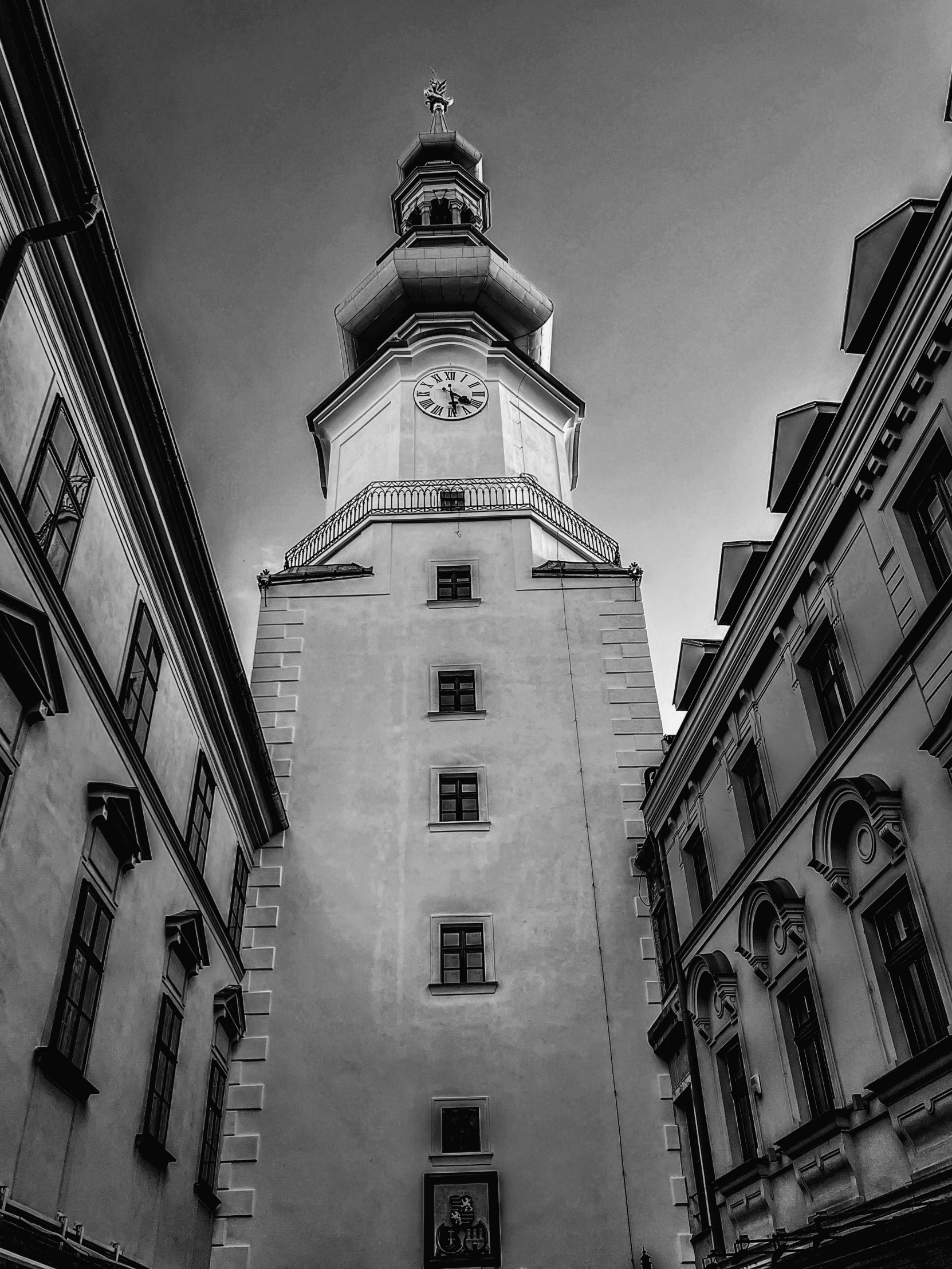 black and white picture of a tall clock tower