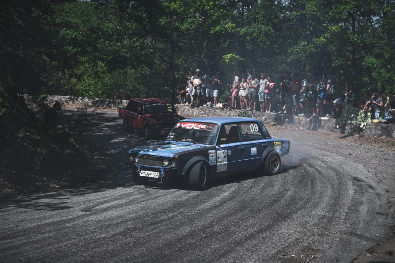 the race truck races on the muddy dirt road