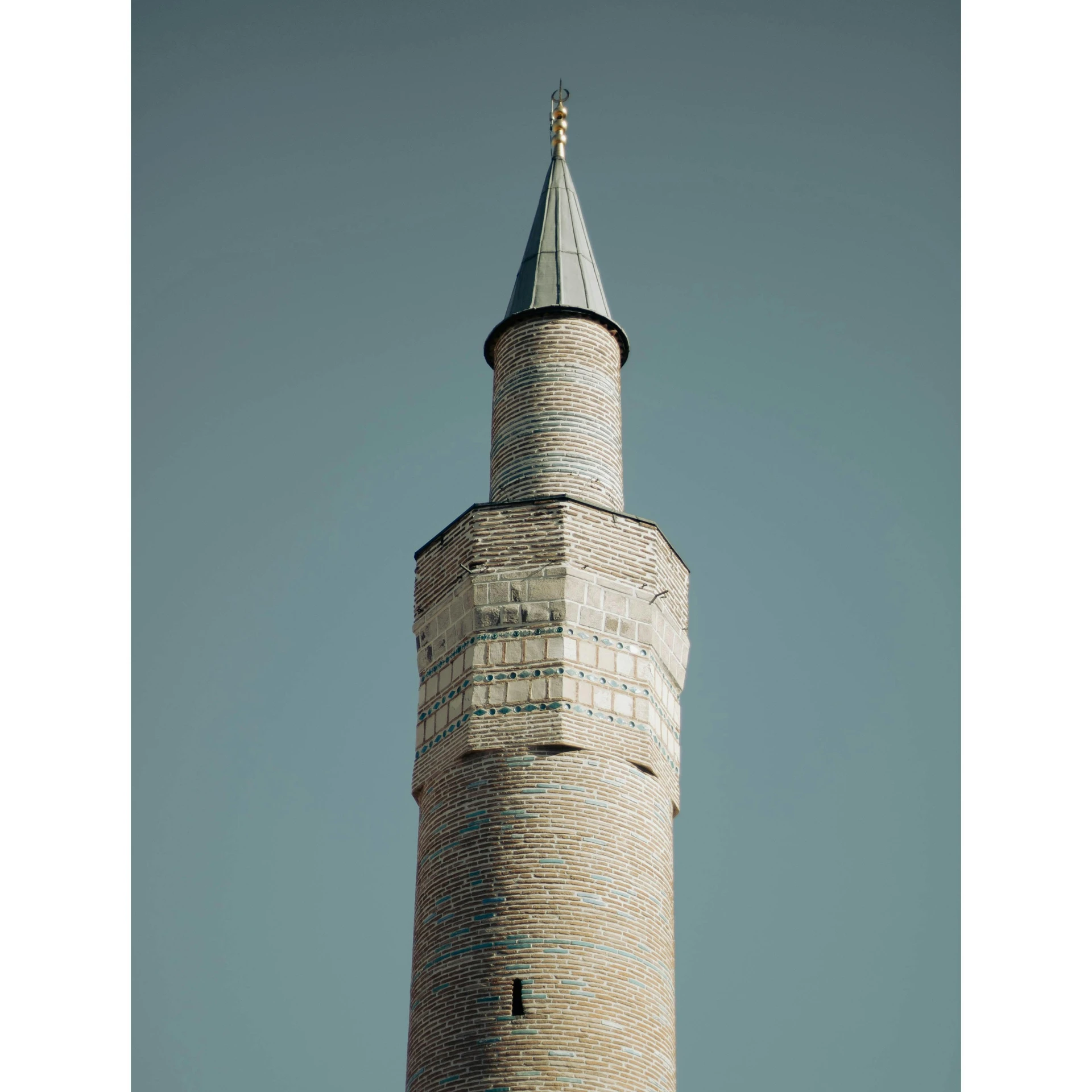 an image of a tall tower made of brick