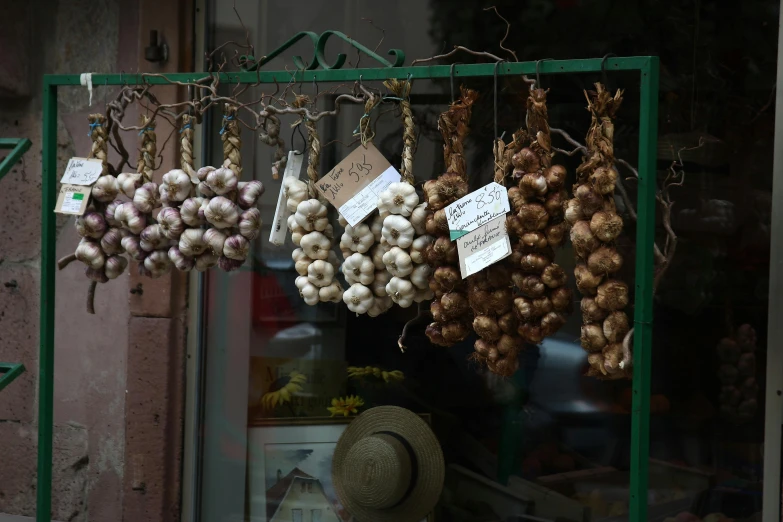 various types of food hang from metal rod