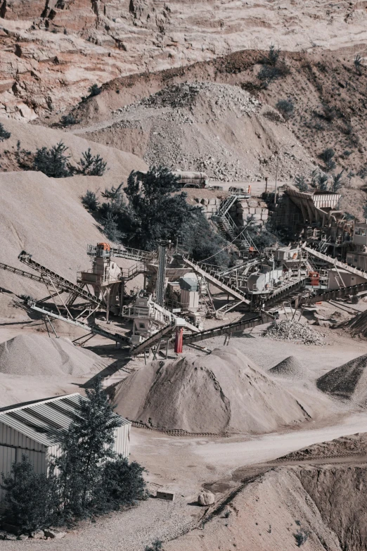 a large sand dump area with large piles of dirt