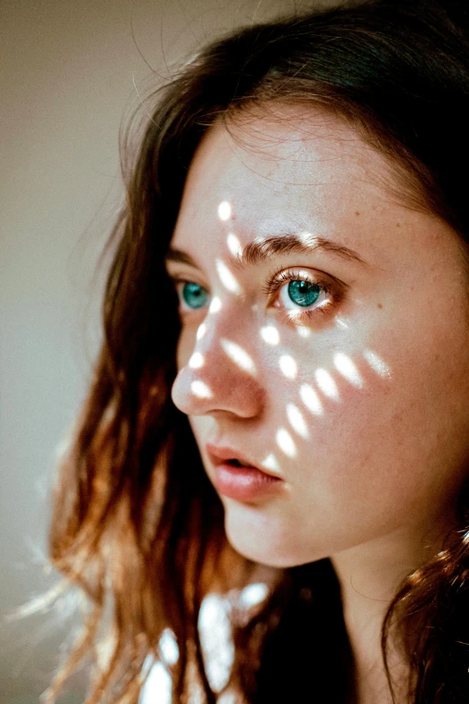 woman with a shadow drawn on her face