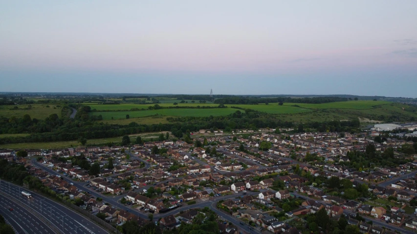 an aerial view of the suburbs in the evening