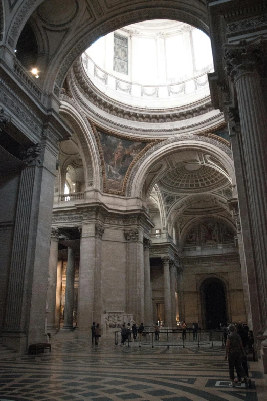 a church with a dome ceiling and columns