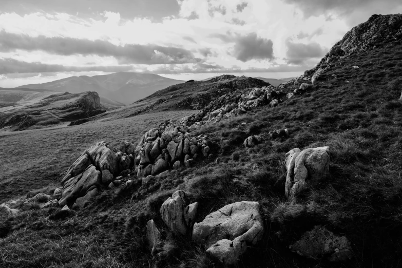 black and white image of a rocky mountain side