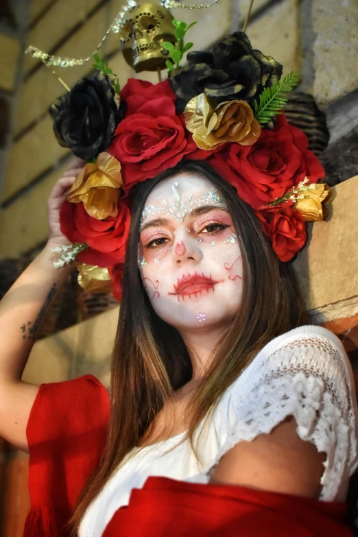 a young woman wearing flowers in her hair