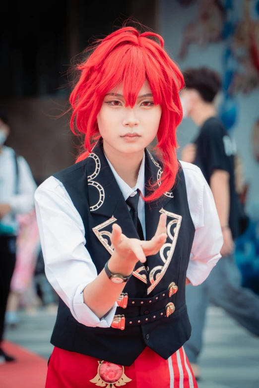 an anime cosplay dressed in a black jacket and red hair