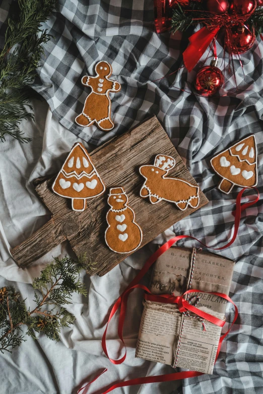 gingerbread cookies sitting on top of a cloth