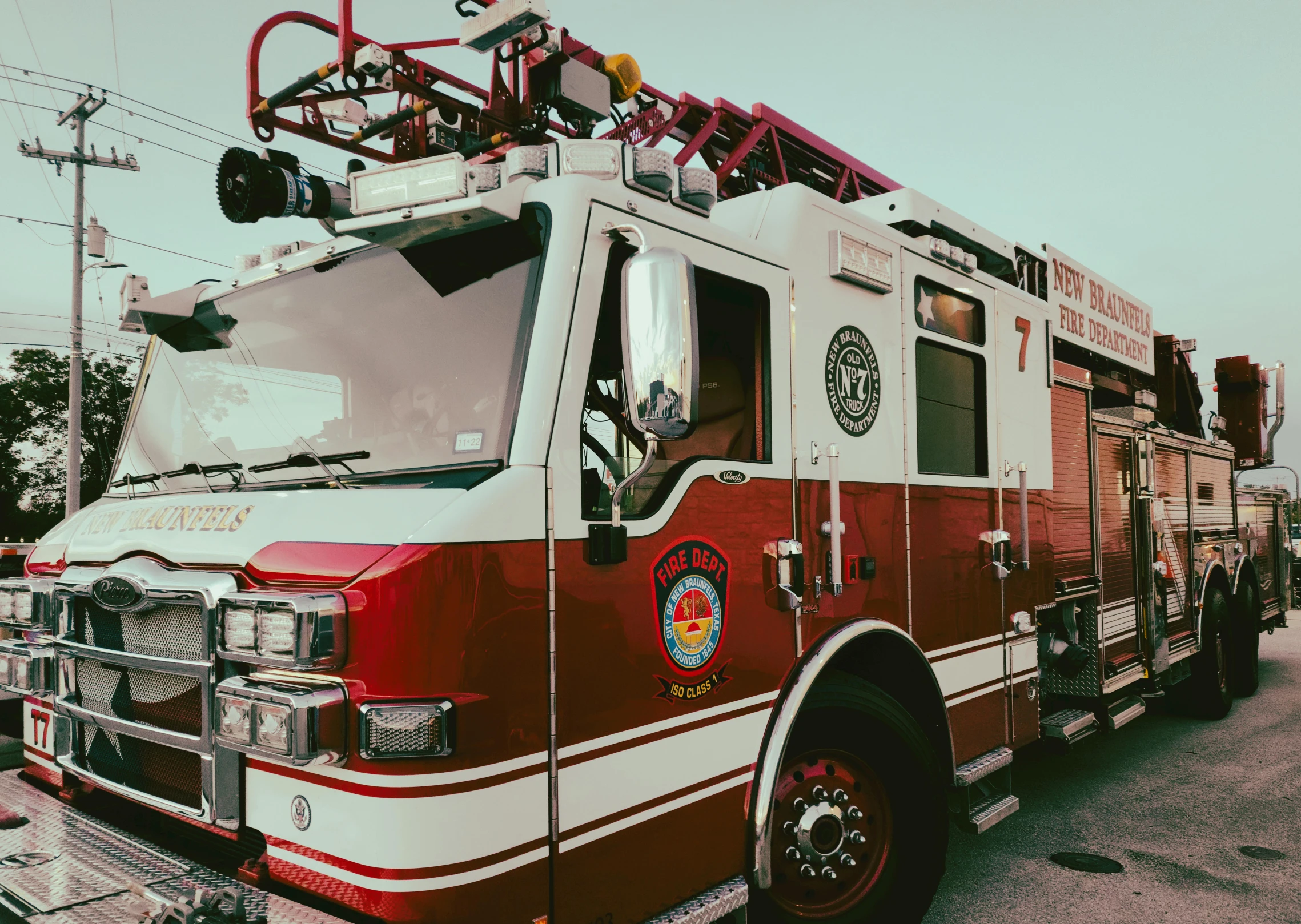 a red and white firetruck parked on the road