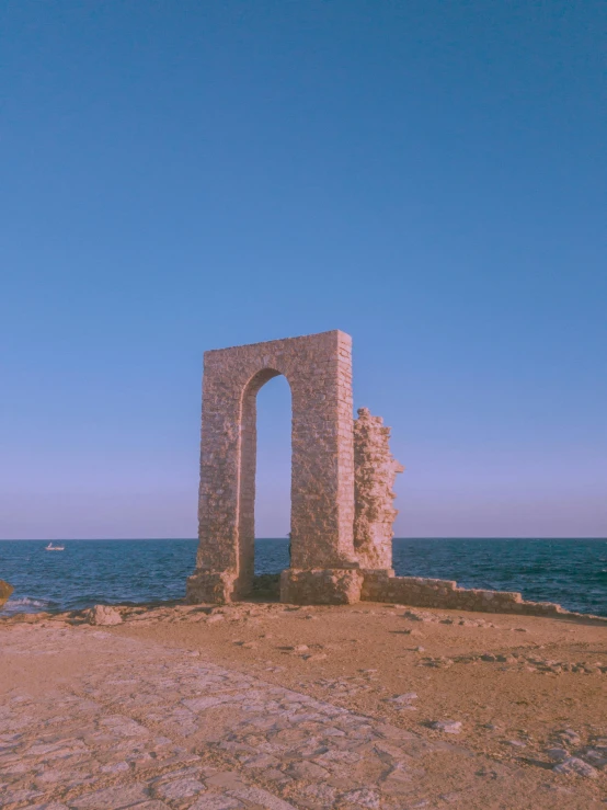 the stone gate is located near the water