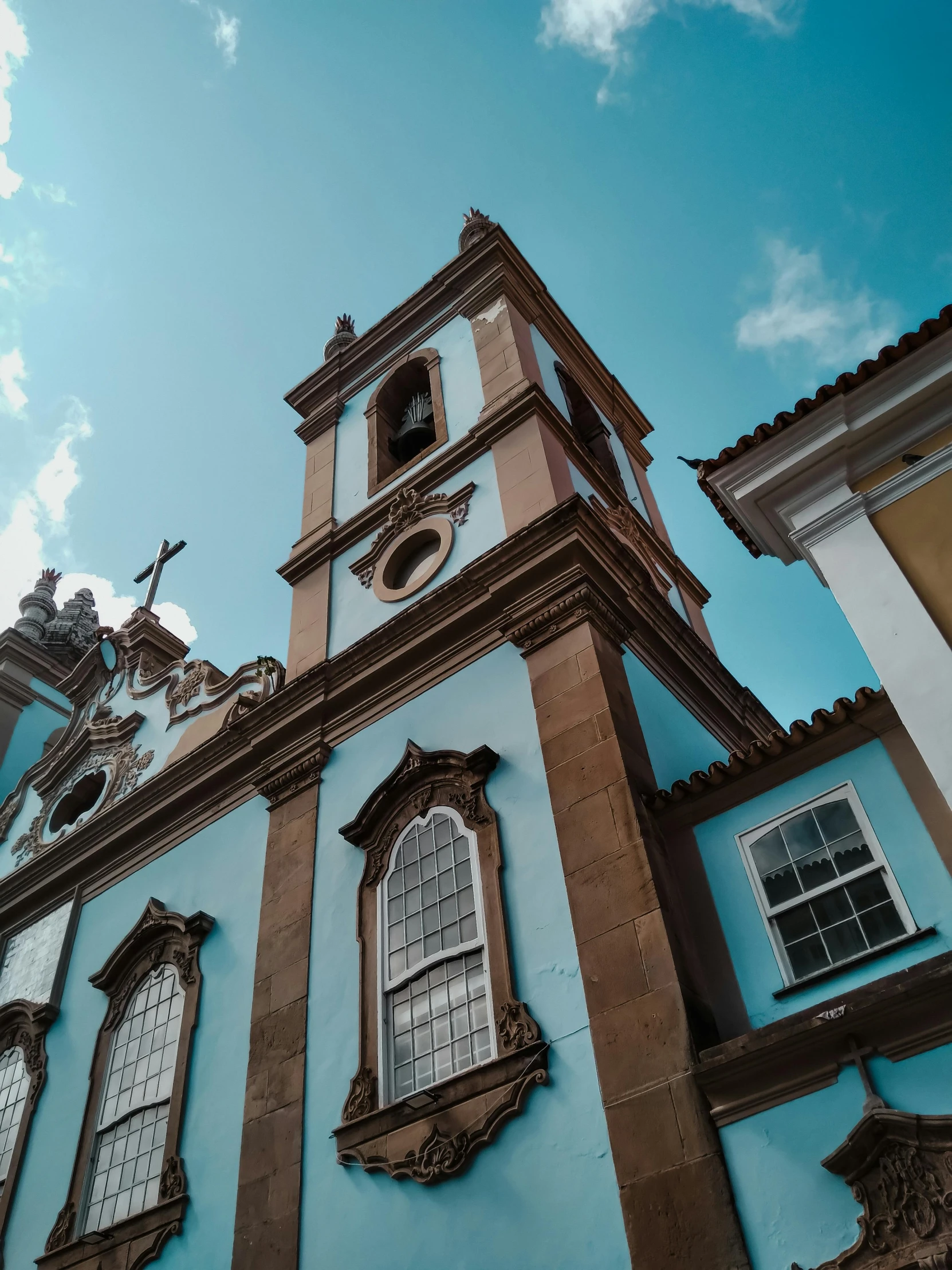 a church is seen on a sunny day