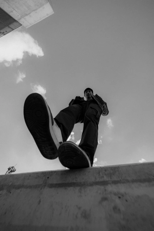 a person on a skateboard performing tricks near buildings