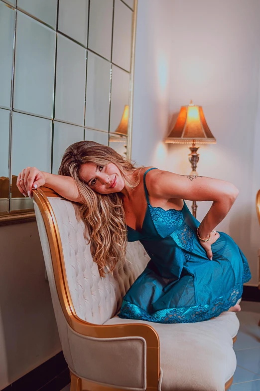 woman sitting in a chair posing for po shoot