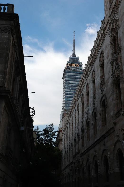 view of the top of an architectural building, next to a street in old london