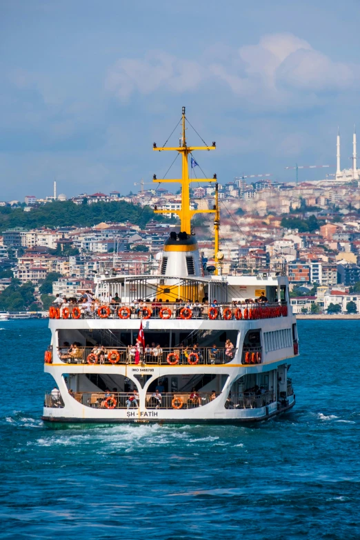 the passenger ship is on the water in the open