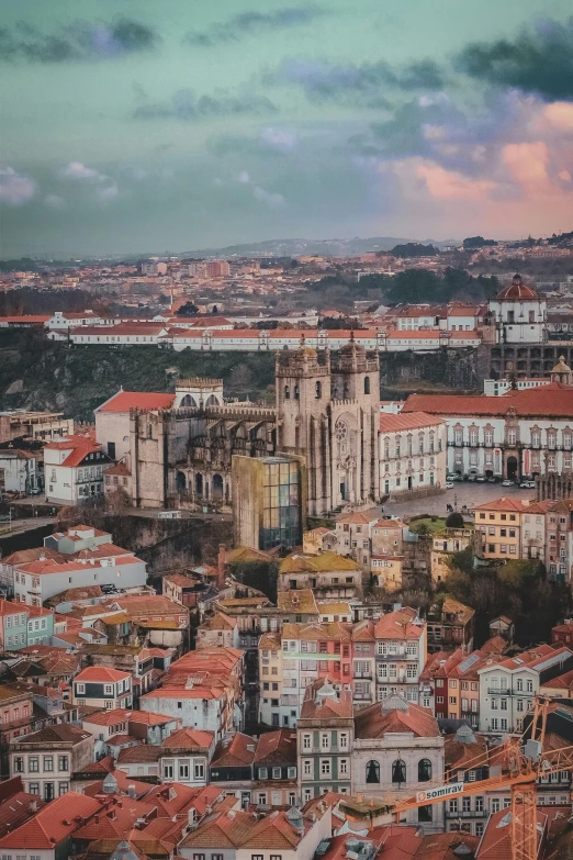 a city skyline in europe with buildings and roofs