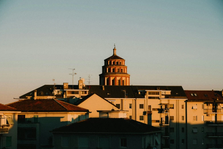 a large tall building with a clock tower