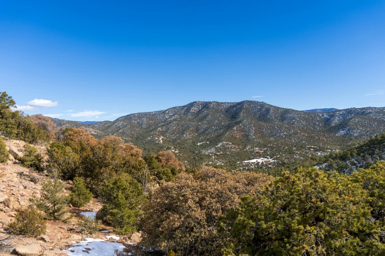 view of snow covered mountains in the foreground