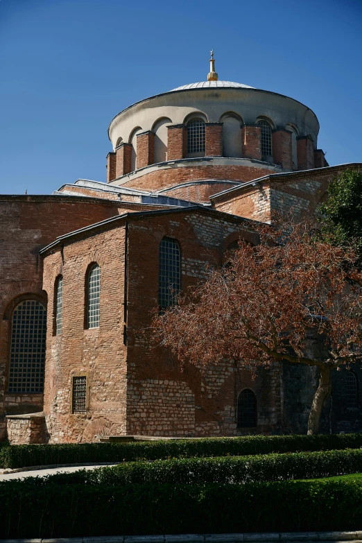 a church with a huge dome in the back