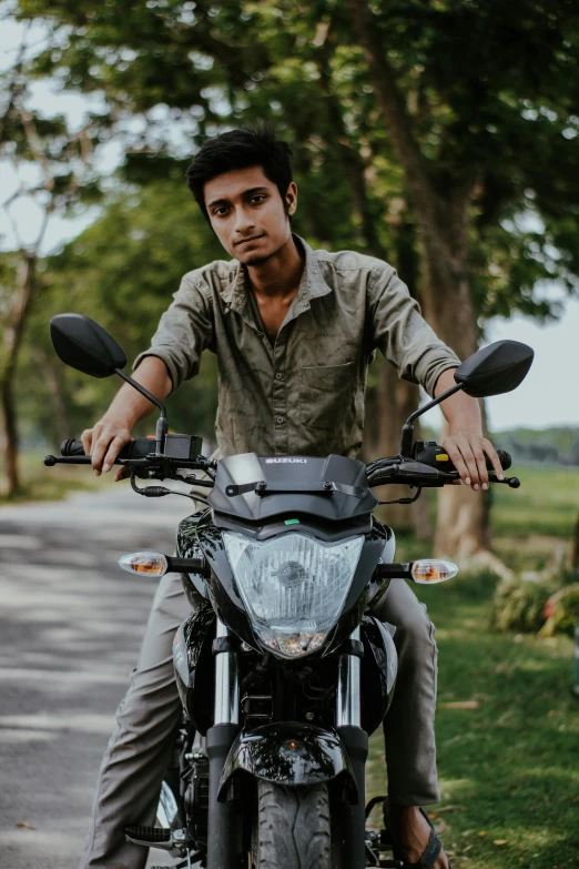 a man riding on the back of a motorcycle